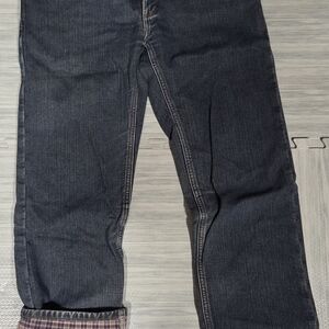 Womens Carhartt Relaxed Fit Flannel-Lined Jeans, style number WB022 ADT.